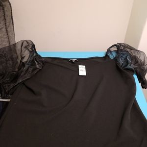 Beautiful black short sleeved shirt with puffed chiffon sleeves.